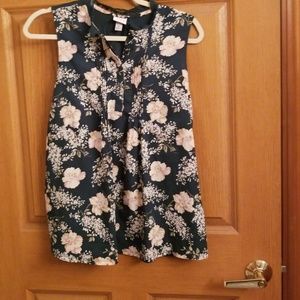Sleeveless flowered shirt